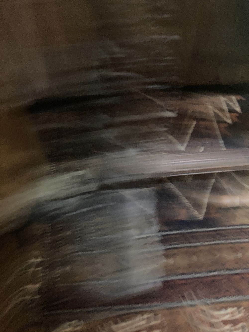 A Burmese hardwood dinner gong, width 104cm height 125cm